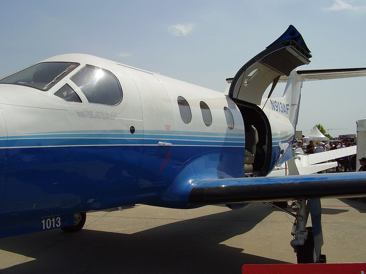 Pilatus PC-12 cargo door open on an airport ramp